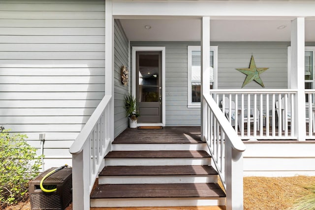 doorway to property featuring a porch