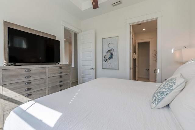 bedroom featuring ceiling fan and connected bathroom