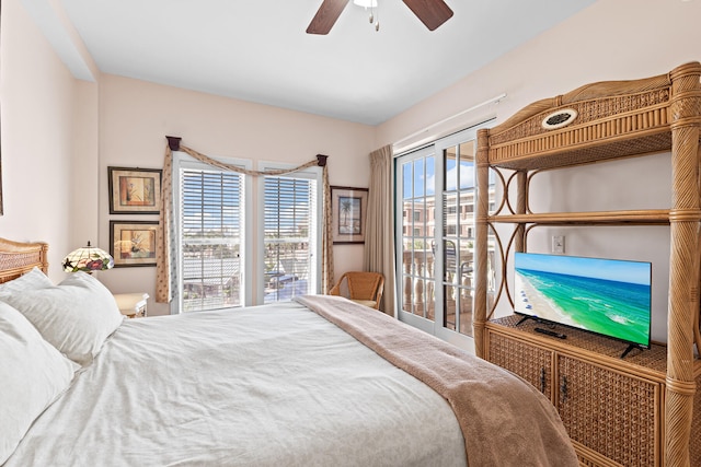 bedroom featuring ceiling fan and access to exterior