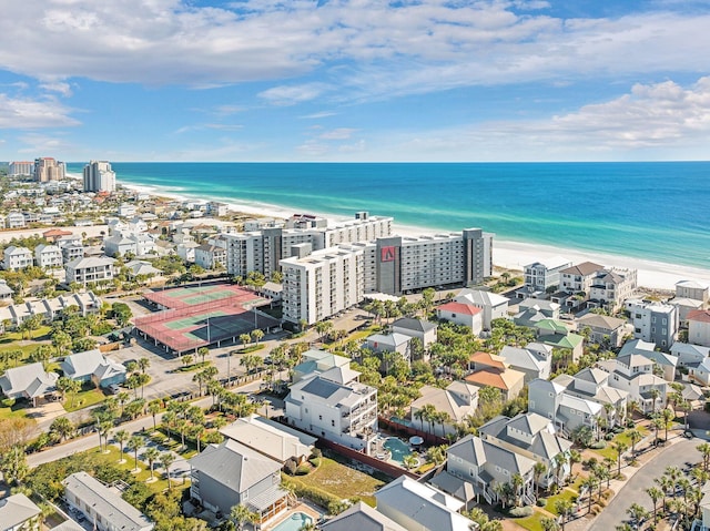 aerial view featuring a view of the beach and a water view