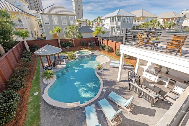 view of pool featuring an in ground hot tub, a gazebo, and a patio