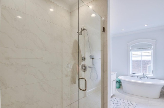 bathroom with vanity, ornamental molding, and plus walk in shower