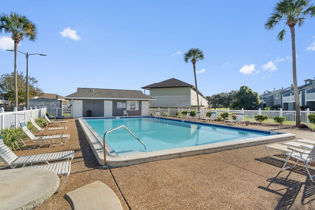 view of swimming pool featuring a patio area