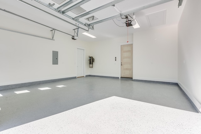 garage featuring a garage door opener and electric panel