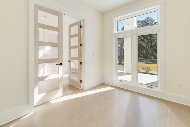 entryway with light wood-type flooring