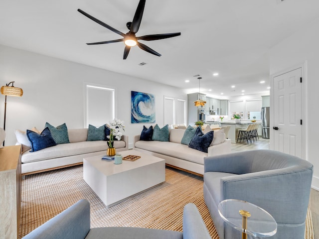 living room with ceiling fan