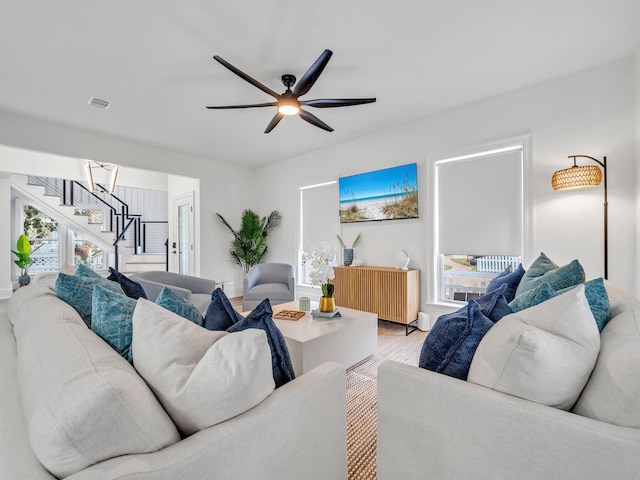 living room featuring radiator heating unit and ceiling fan