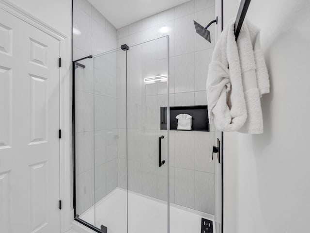 bathroom featuring walk in shower