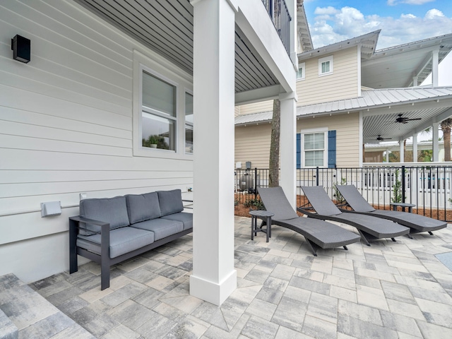 view of patio / terrace featuring ceiling fan and an outdoor hangout area