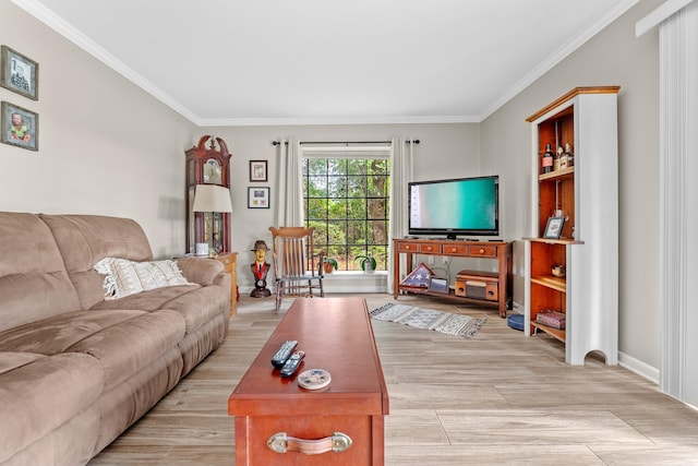 living room featuring light wood-type flooring and crown molding