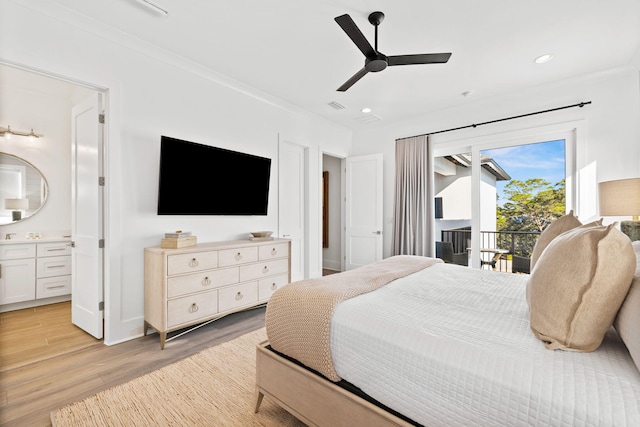 bedroom with access to exterior, connected bathroom, ornamental molding, ceiling fan, and light hardwood / wood-style flooring