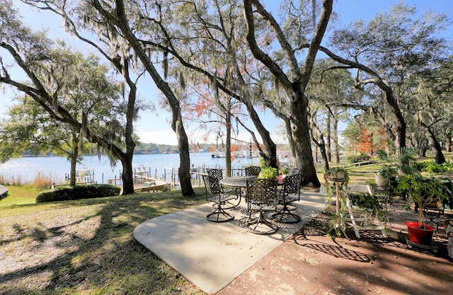 view of patio / terrace with a water view