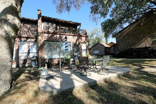 view of patio / terrace featuring a balcony