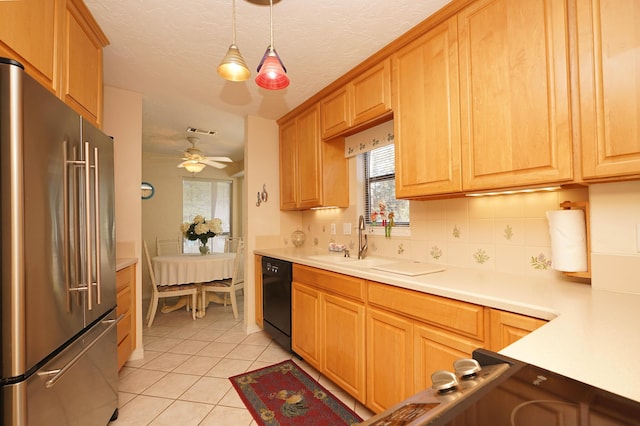 kitchen featuring light tile patterned flooring, decorative light fixtures, black dishwasher, high end refrigerator, and ceiling fan