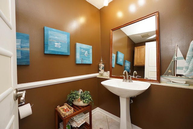 bathroom featuring tile patterned flooring