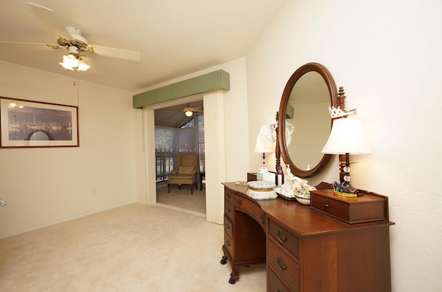 carpeted home office with ceiling fan