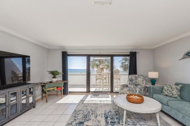 tiled living room featuring crown molding and a water view