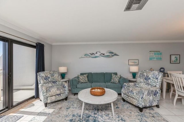 living room featuring a wealth of natural light, crown molding, and light tile patterned floors