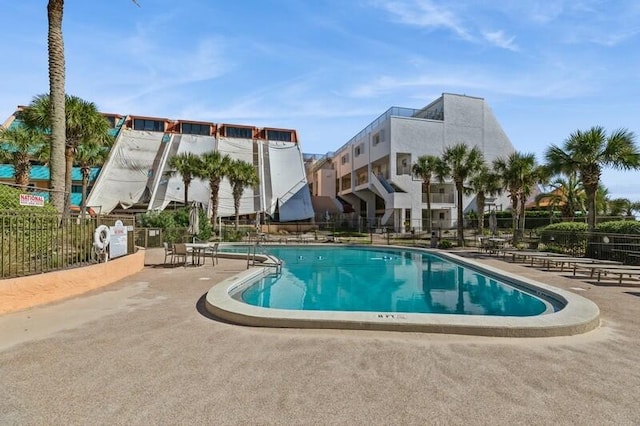 view of swimming pool featuring a patio