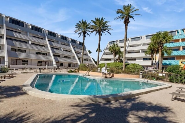 view of swimming pool with a patio area