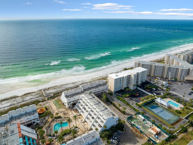 aerial view with a beach view and a water view