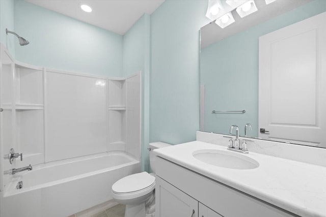 full bathroom featuring vanity, toilet, and bathtub / shower combination