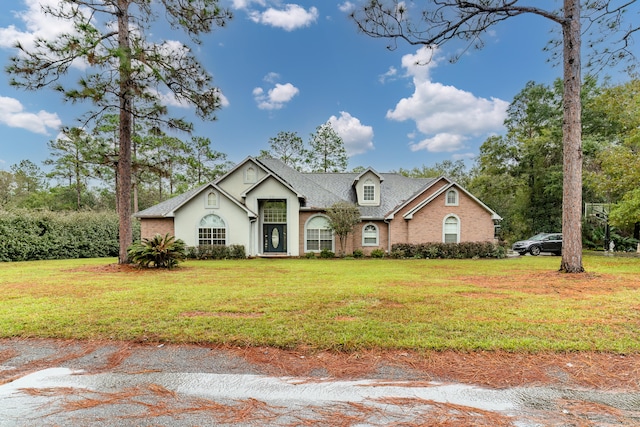 view of front of home with a front lawn