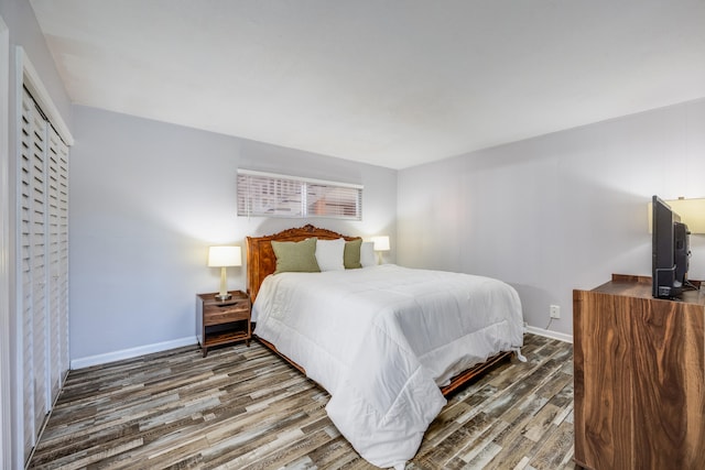 bedroom with hardwood / wood-style floors