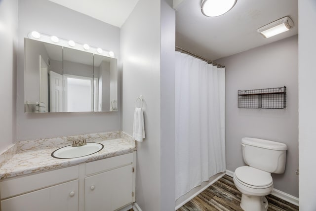 bathroom with a shower with curtain, vanity, toilet, and wood-type flooring