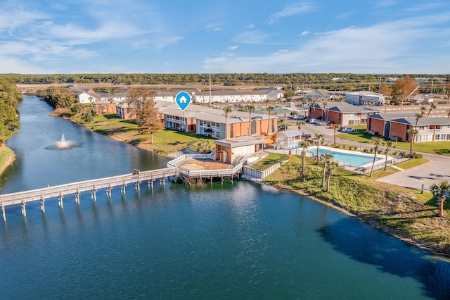 drone / aerial view with a water view