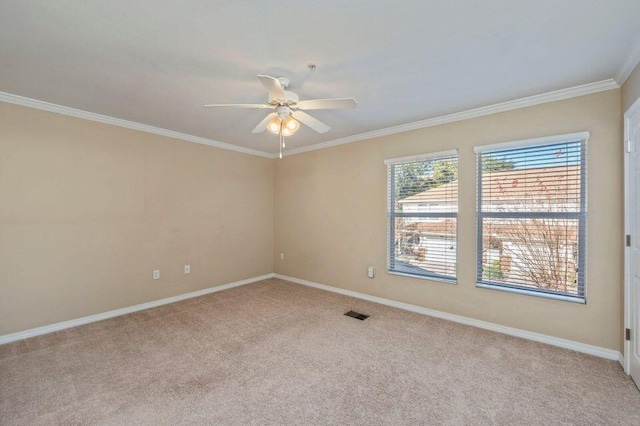 17 SE Shell Ave Unit B2, Fort Walton Beach, FL 32548 - spare room with light colored carpet, a ceiling fan, baseboards, and crown molding