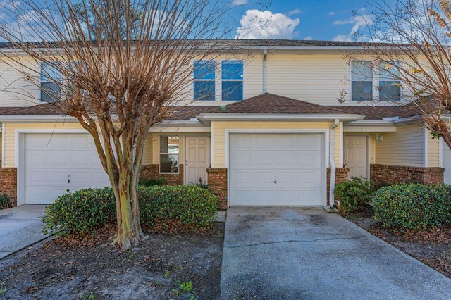 17 SE Shell Ave Unit B2, Fort Walton Beach, FL 32548 - multi unit property with driveway, brick siding, and an attached garage
