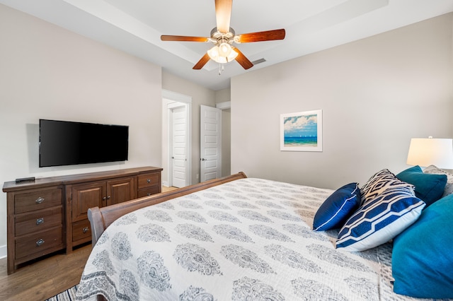 bedroom featuring light hardwood / wood-style flooring and ceiling fan