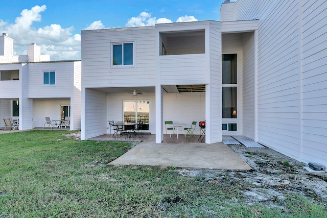 900 Gulf Shore Dr Unit 03, Destin, FL 32541 - rear view of house featuring a yard, ceiling fan, and a patio area