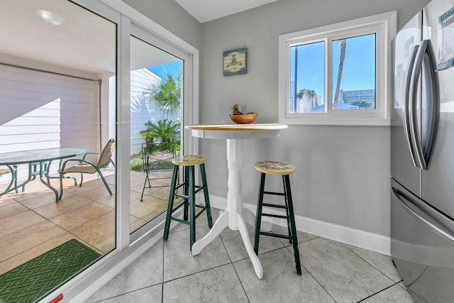 900 Gulf Shore Dr Unit 03, Destin, FL 32541 - dining space with baseboards