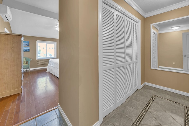 900 Gulf Shore Dr Unit 03, Destin, FL 32541 - corridor with a wall mounted AC, baseboards, and crown molding