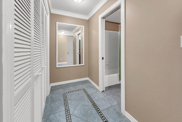 900 Gulf Shore Dr Unit 03, Destin, FL 32541 - hallway featuring baseboards, ornamental molding, and tile patterned flooring