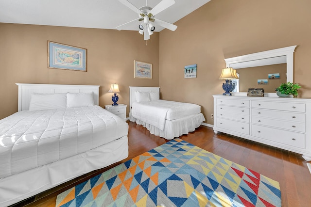 900 Gulf Shore Dr Unit 03, Destin, FL 32541 - bedroom featuring vaulted ceiling, dark wood-style floors, and baseboards