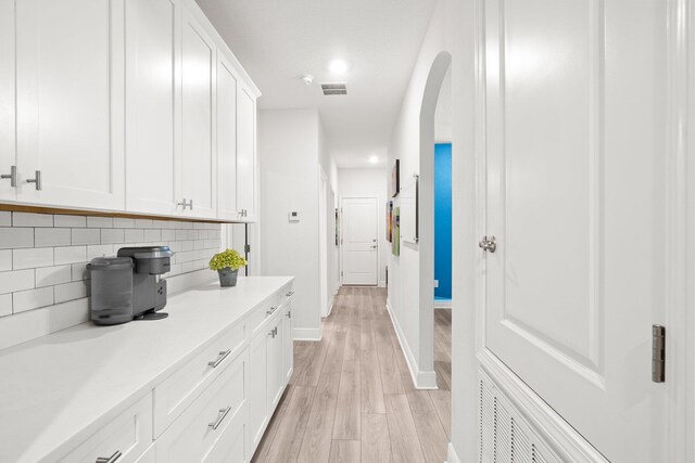 hall featuring light hardwood / wood-style floors