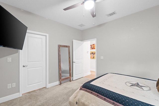 bedroom featuring ceiling fan and carpet floors