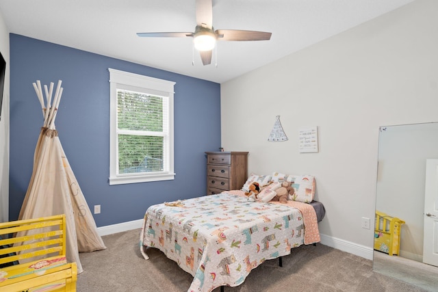 carpeted bedroom with ceiling fan