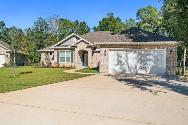 view of front facade featuring a garage and a front lawn