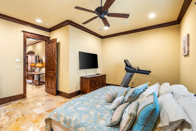 bedroom featuring stone tile flooring, baseboards, and a textured wall