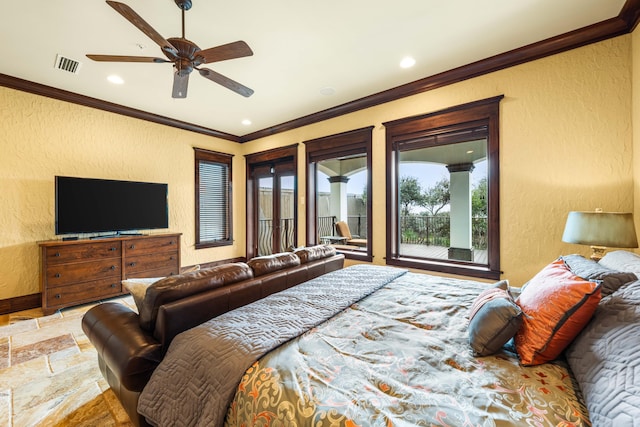 bedroom featuring visible vents, stone tile floors, crown molding, baseboards, and a textured wall