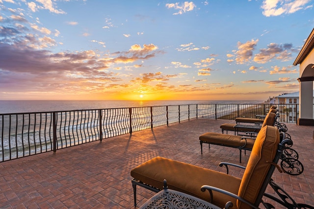 view of patio / terrace featuring a water view