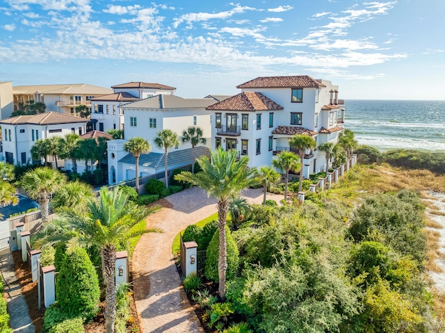 bird's eye view featuring a residential view and a water view