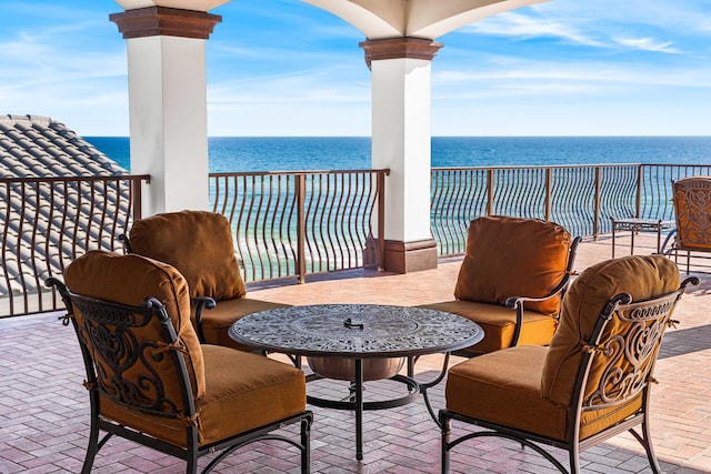 view of patio / terrace featuring a water view