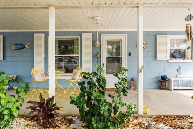 entrance to property with a porch