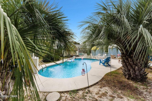 view of pool with a patio