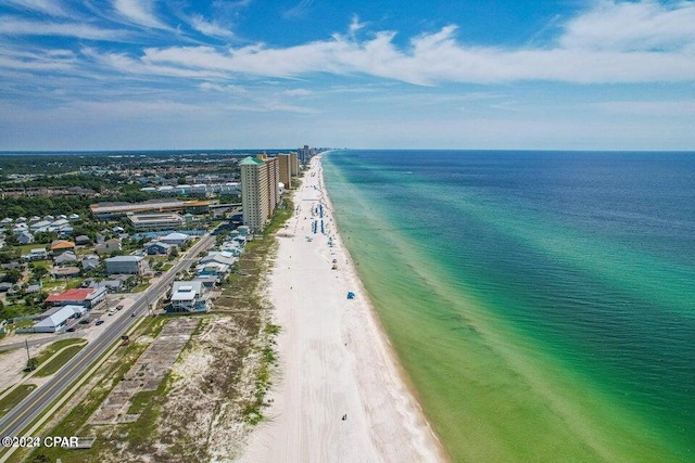 bird's eye view with a view of the beach and a water view